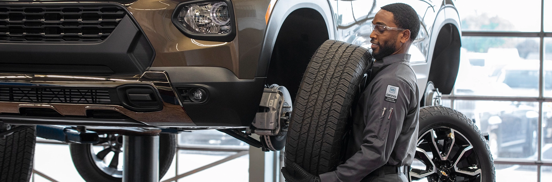 Chevy Service tech working on a car