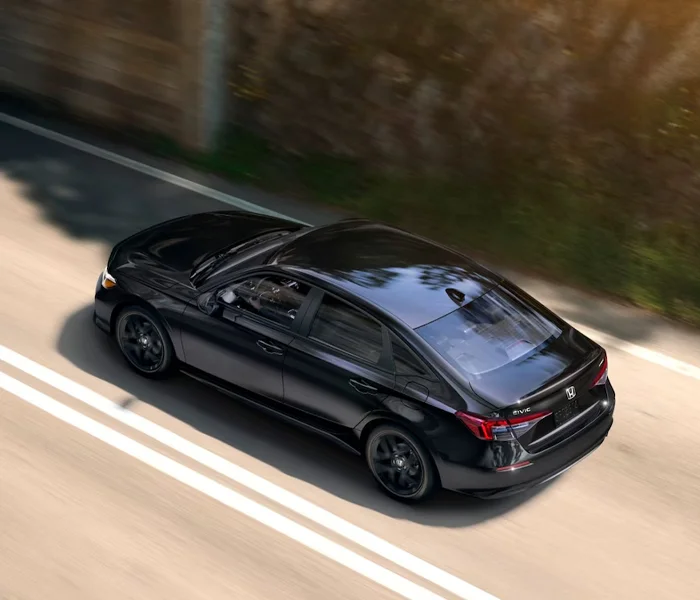 Honda Civic Driving Down a highway from above