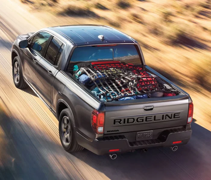 Honda Ridgeline Driving Down Highway