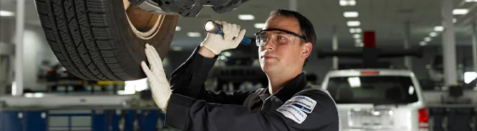 Honda Service Tech Checking Tires