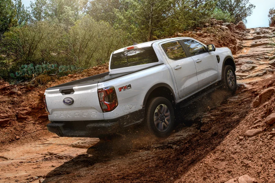Why Buy At Mathieu Ford Ford Ranger driving on dirt