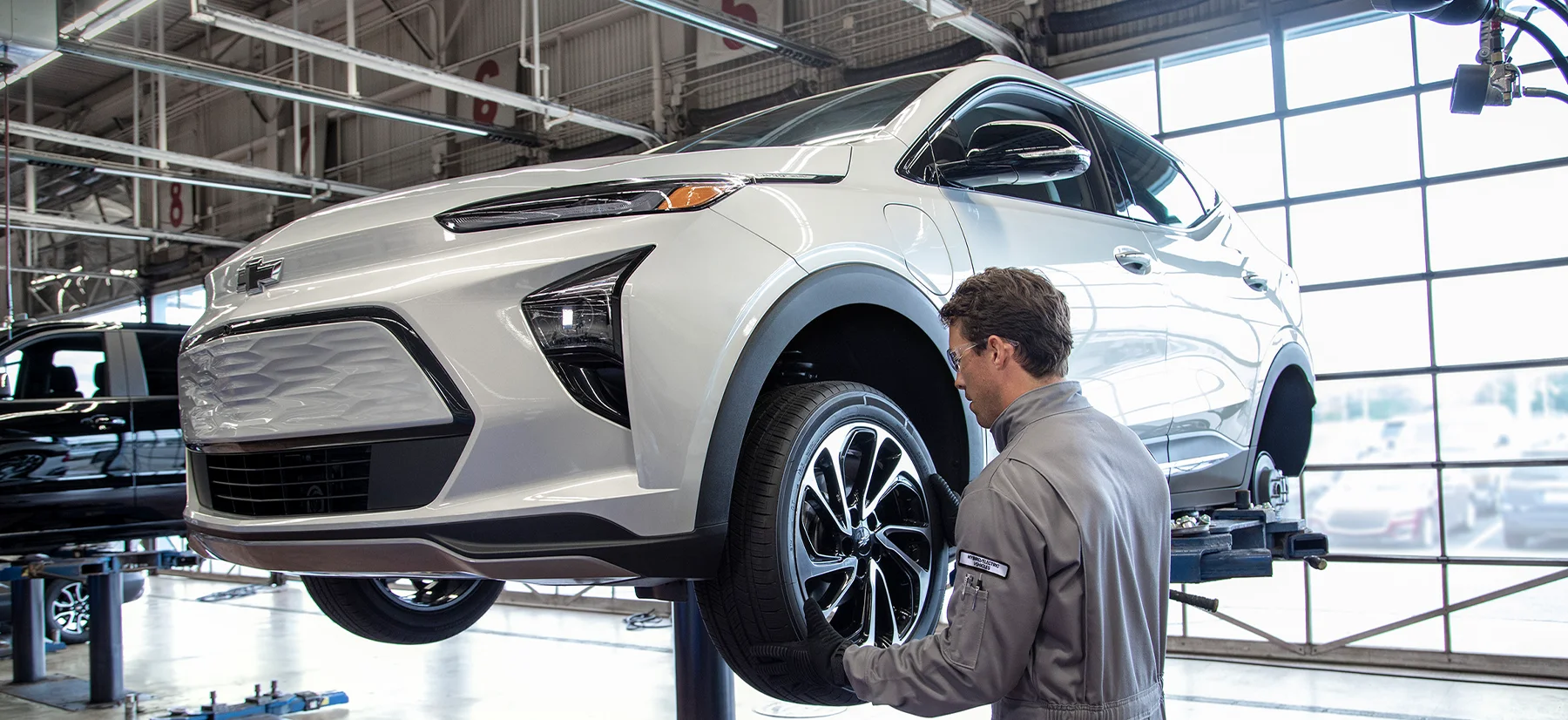 Chevy Service tech working on a car