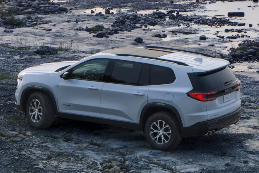 GMC Acadia parked on rocks