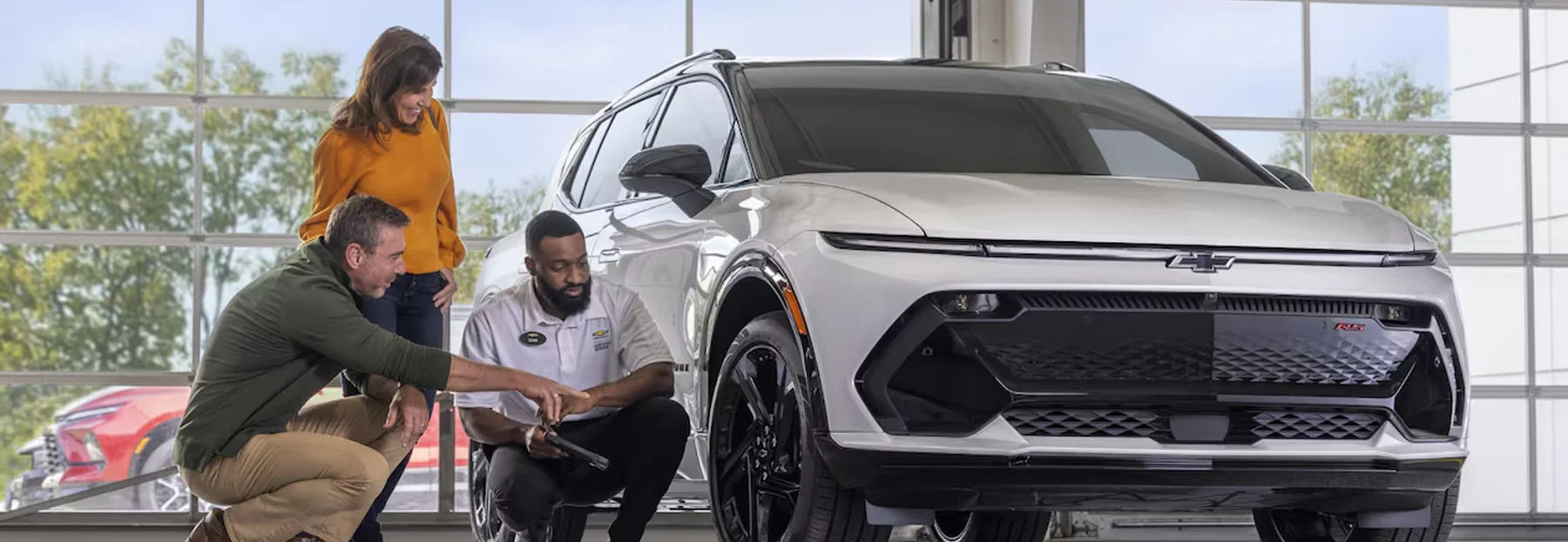 Chevy Service tech working on a car