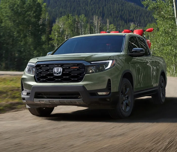 Honda Ridgeline on a dirt road