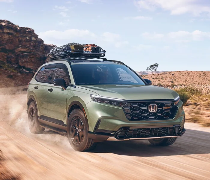Honda CR-V Driving Down Dirt Road