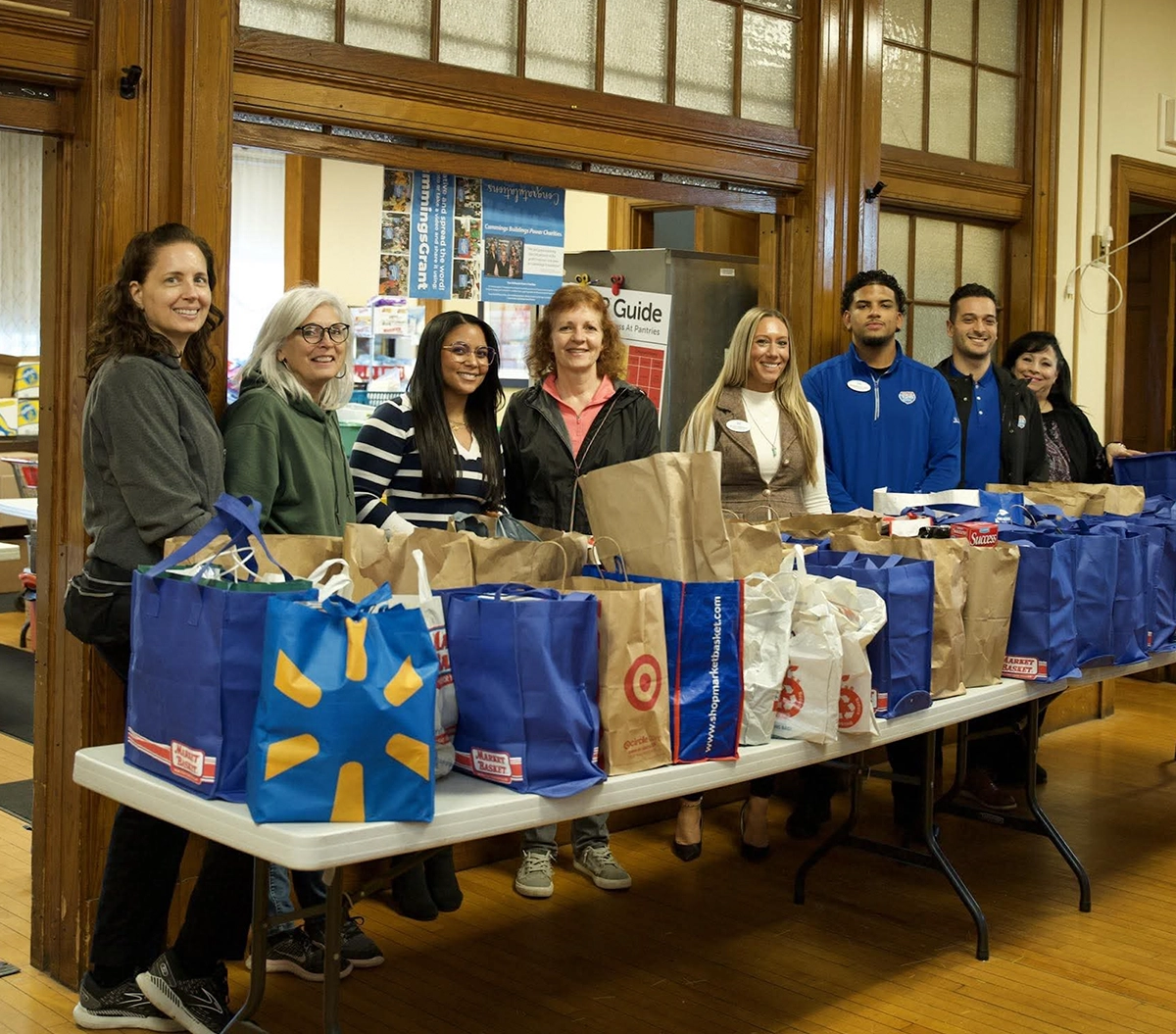 Staff with bags of food