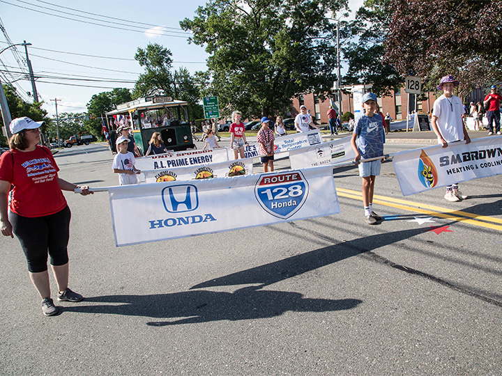 Dan Loggins signing the check